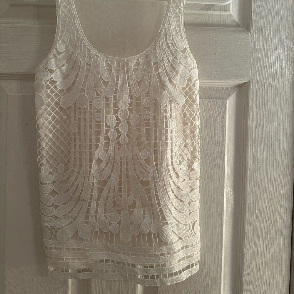 Unworn white tank top.